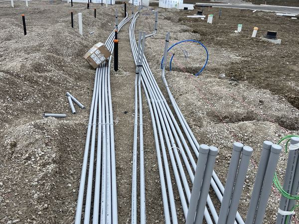 Underground PVC conduit duct bank with stub-ups on a new build site