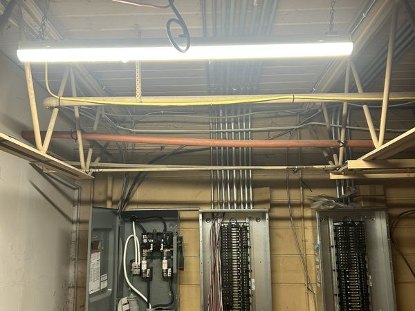 Electrical room with panels and EMT conduit runs